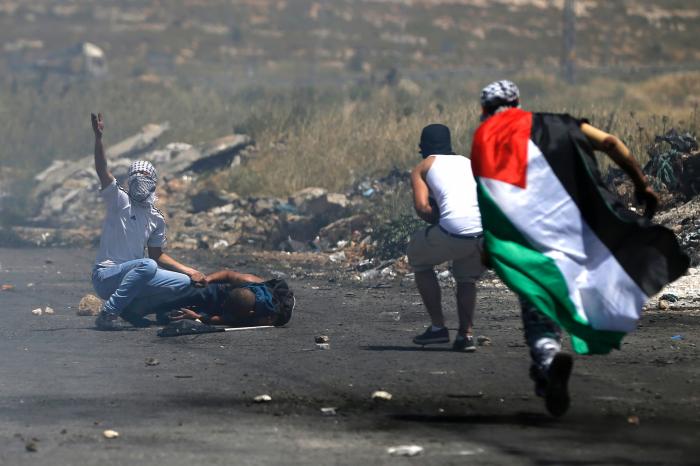 إصابة 7 مواطنين في مواجهات شرق رام الله في جمعة "الوفاء للشهداء والجرحى في المغير"