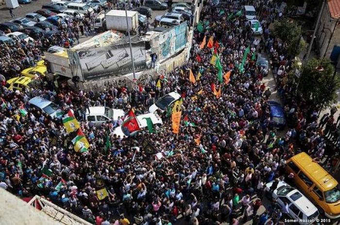 اهالي بني نعيم يشيعون الشهيد طرايرة