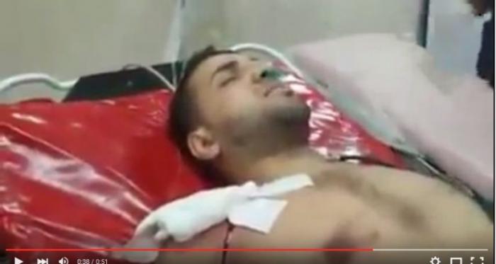 الشهيد خليل أبو عبيد يتلو القرآن أثناء إصابته برصاص الاحتلال