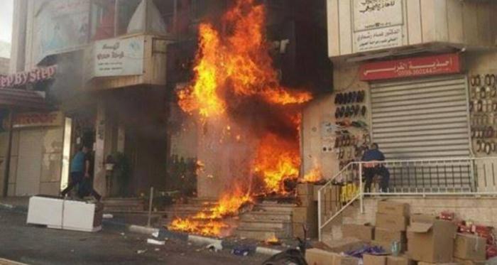 قتيلان وحرق محال تجارية وشقق سكنية فى شجار عائلى فى بيت لحم 
